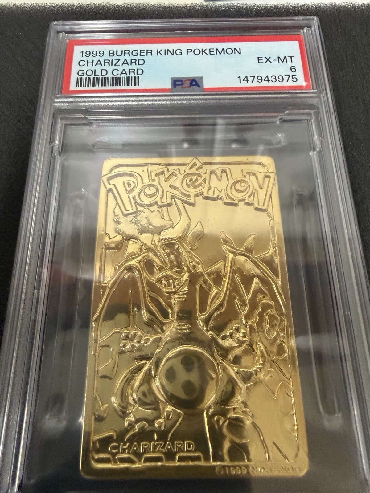 Listing photo for 1999 23K BURGER KING POKEMON GOLD CARD - CHARIZARD EX-MT PSA 6