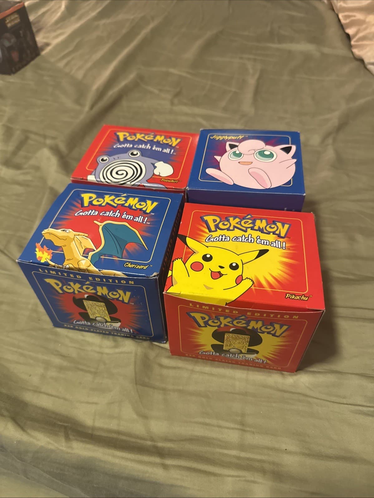 Listing photo for 4x 1999 Burger King 23k gold-plated Pokémon cards (charizard, pikachu, polywhirl