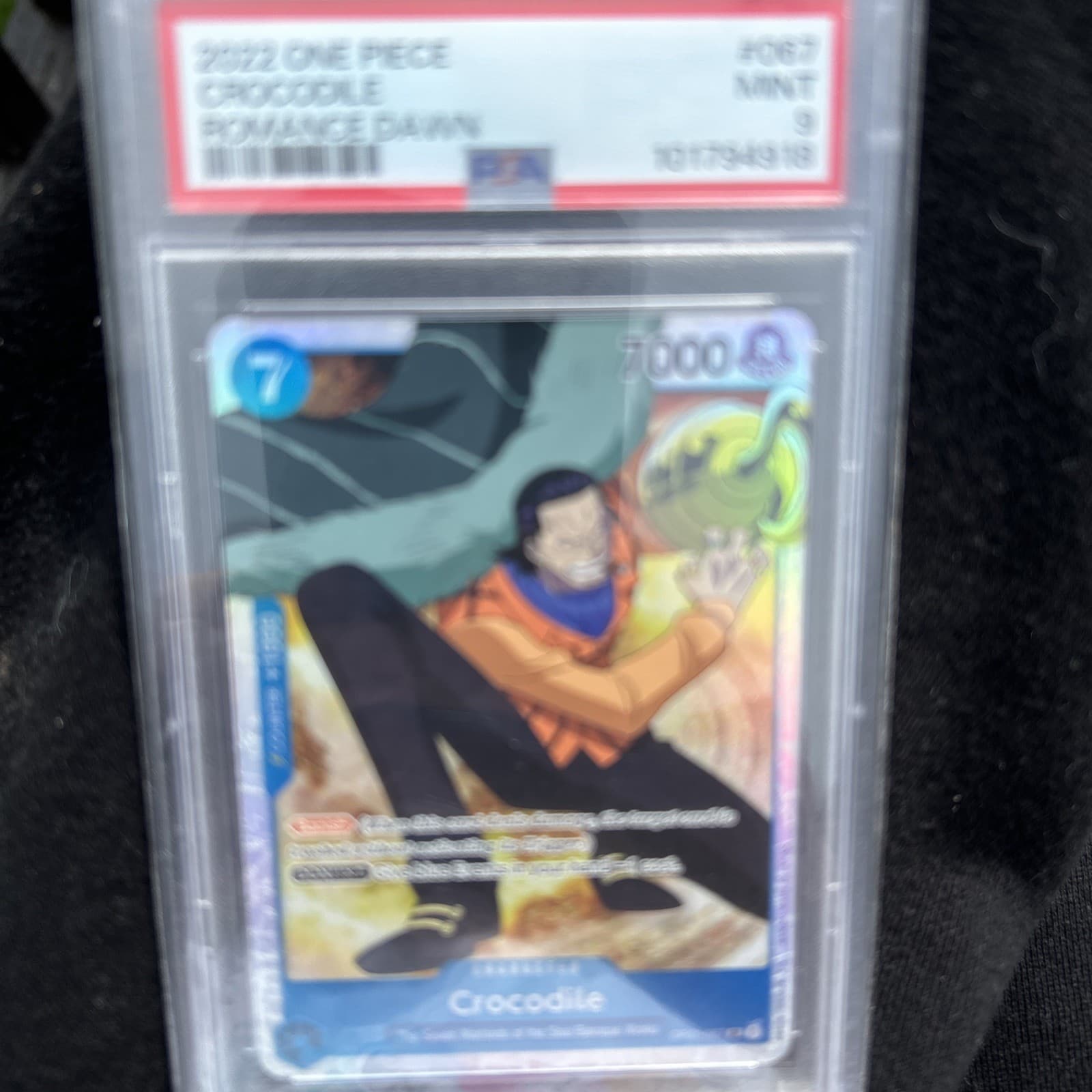Listing photo for 2022 ONE PIECE ROMANCE DAWN OP01-067 CROCODILE - PSA 9 - ENGLISH #67 LOW POP!