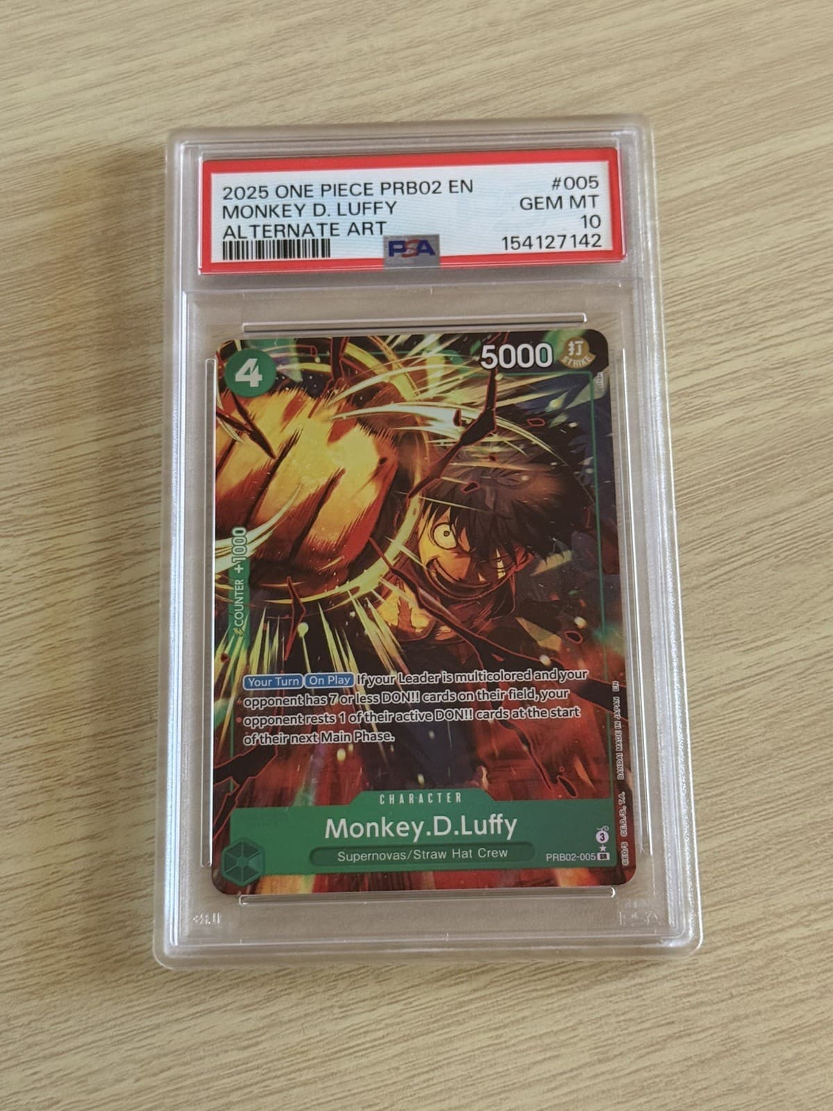 Listing photo for 2025 One Piece PRB02 Cover Photo #005 Monkey D. Luffy Alt Art PSA 10