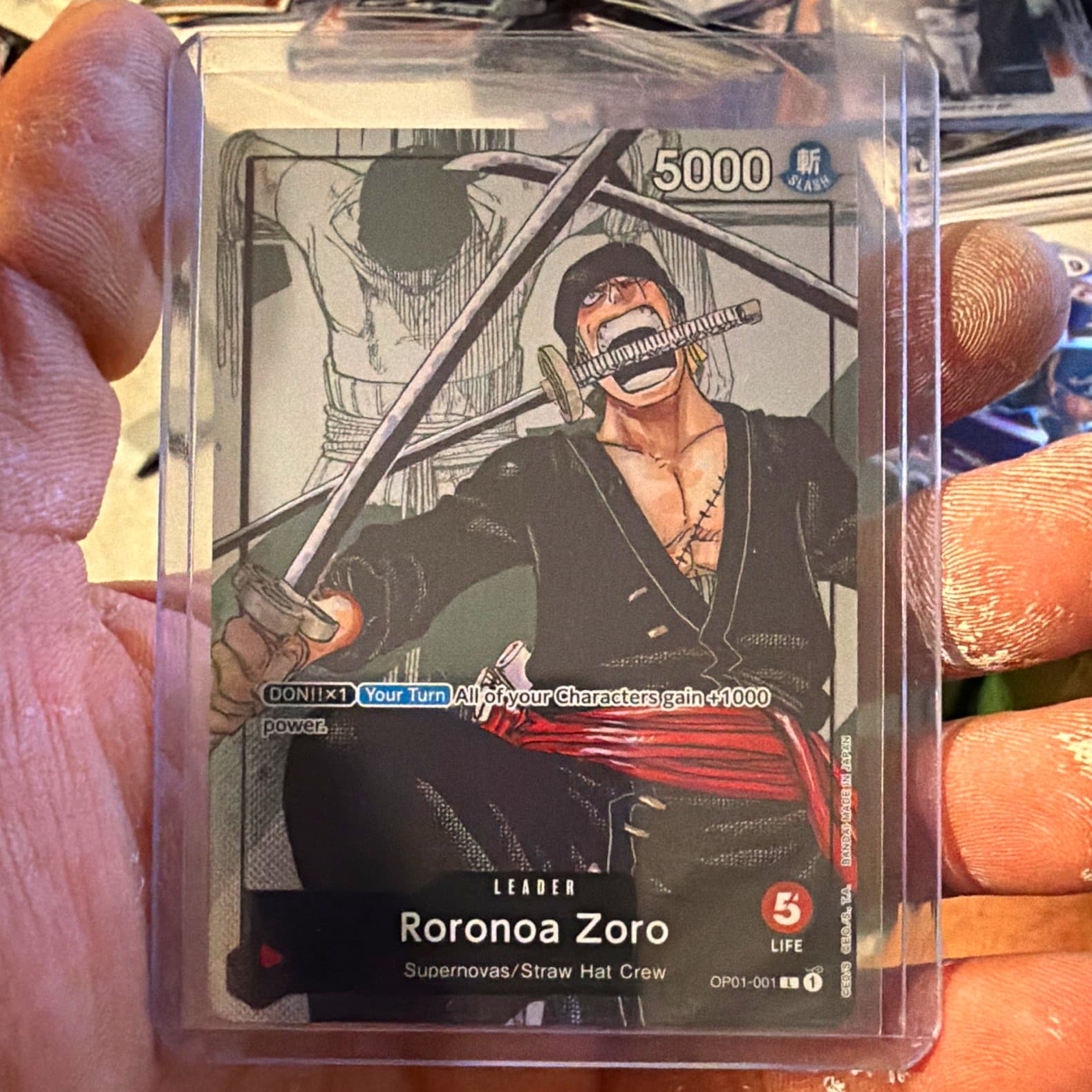 Listing photo for Bandai One Piece Card Game Roronoa Zoro Leader OP01-001 5000 Power