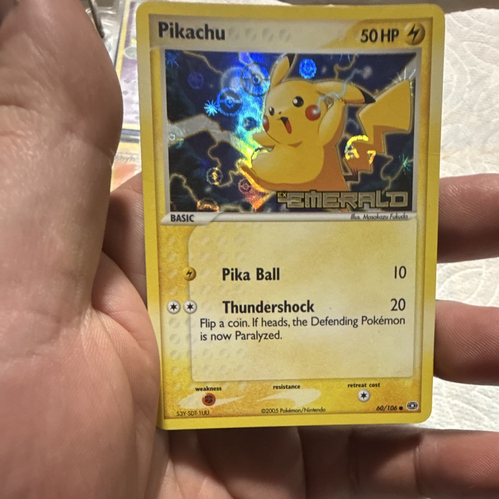 Listing photo for Pikachu 60/106 EX Emerald Reverse Holo