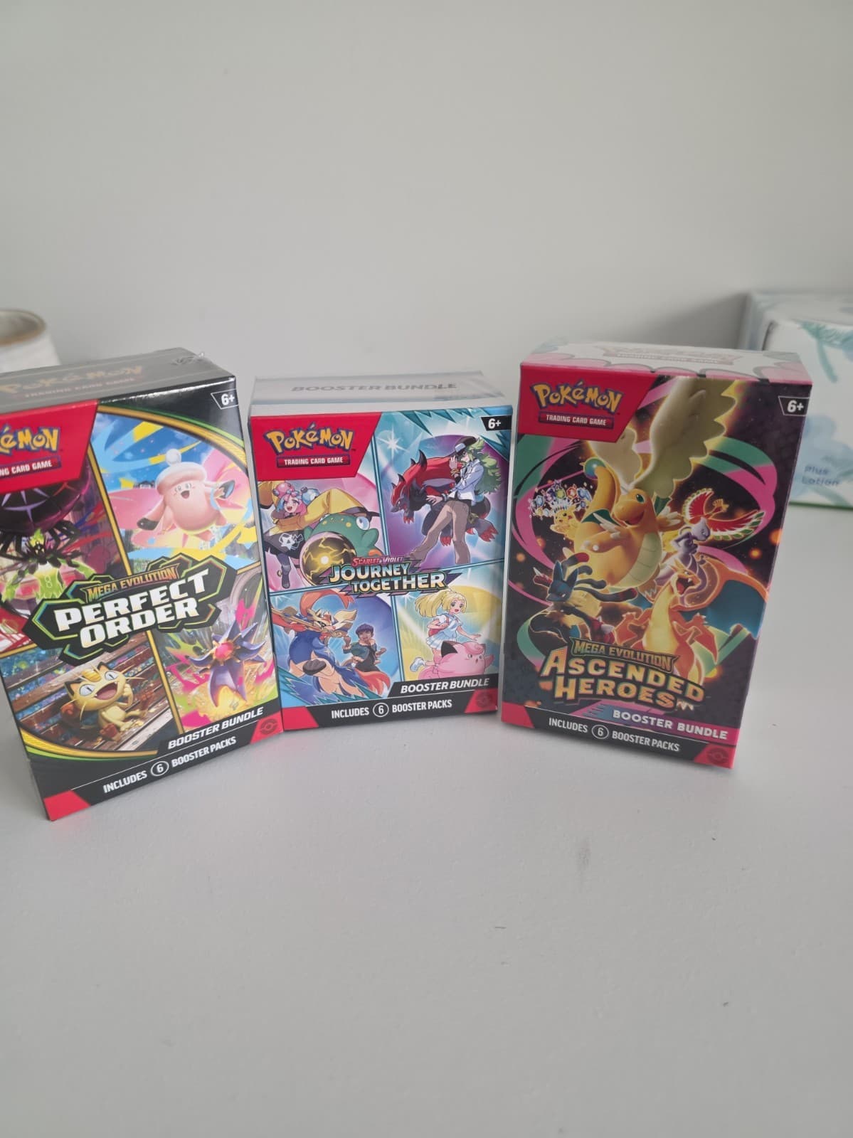 Listing photo for Pokemon Ascended Heroes, Journey Together, and Perfect Order Bundle New Sealed.