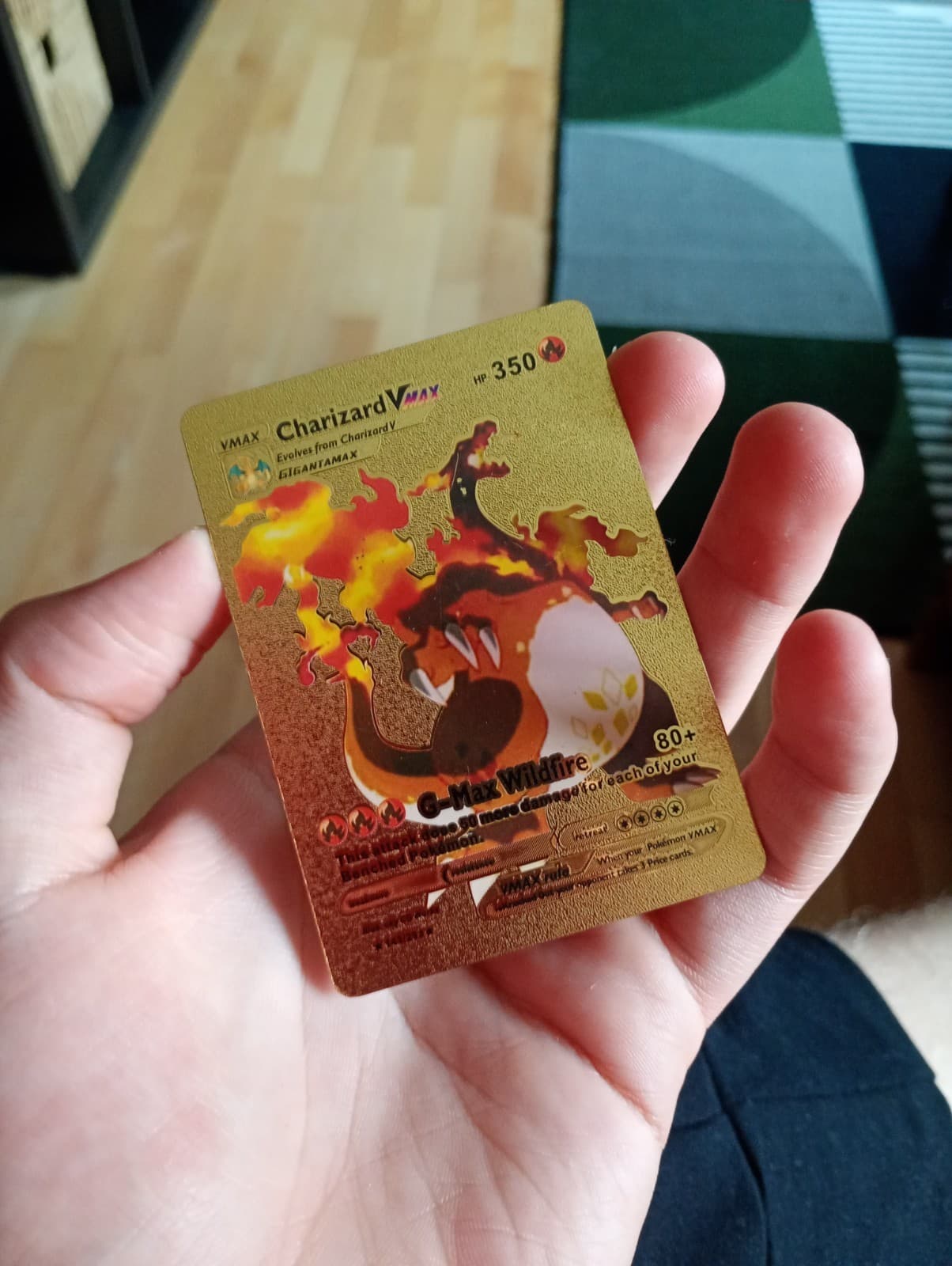 Listing photo for Pókemon Charizard Golden Premium Edition 2006