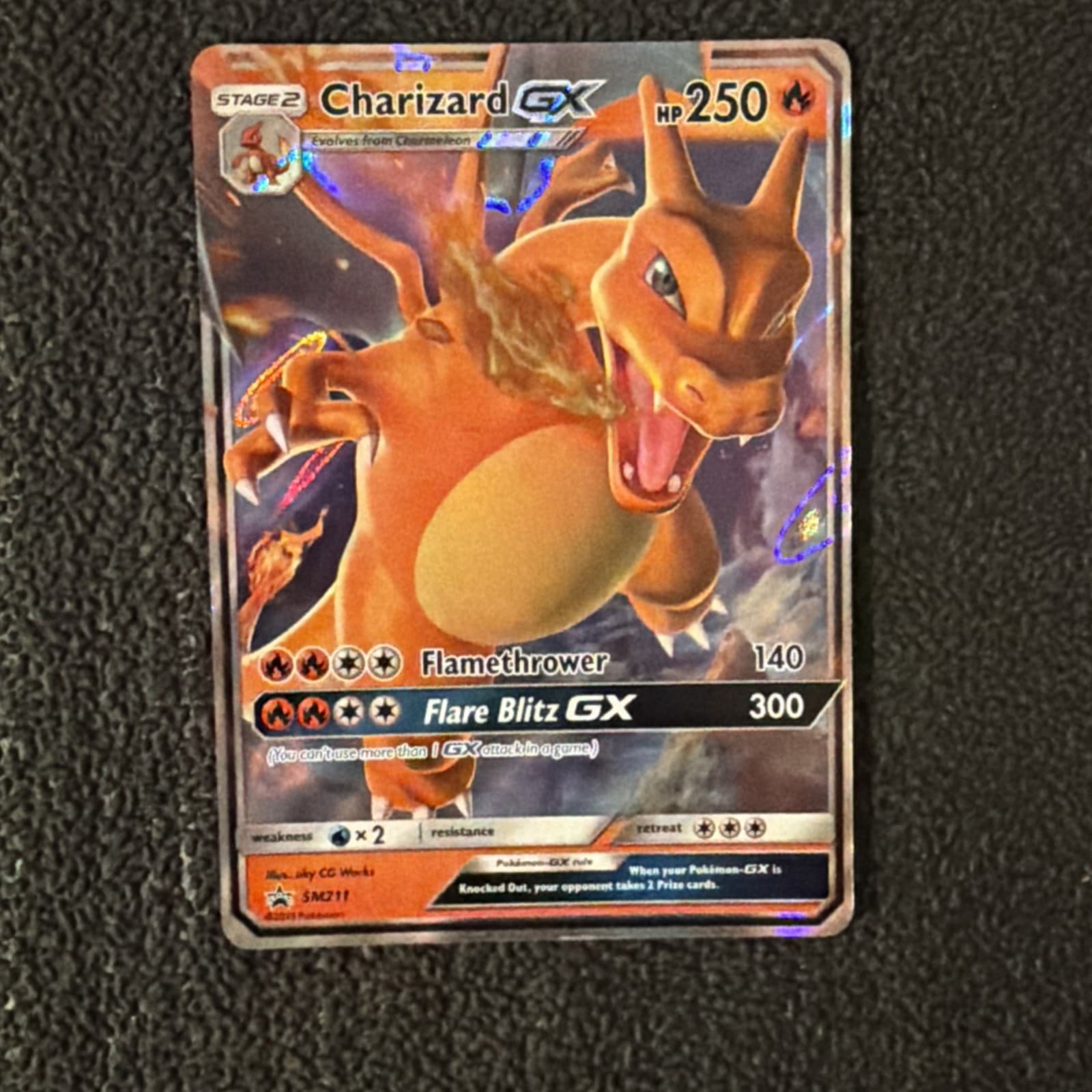 Listing photo for Pokemon English TCG Card Sun & Moon Promo SM211 Charizard GX Standard Size