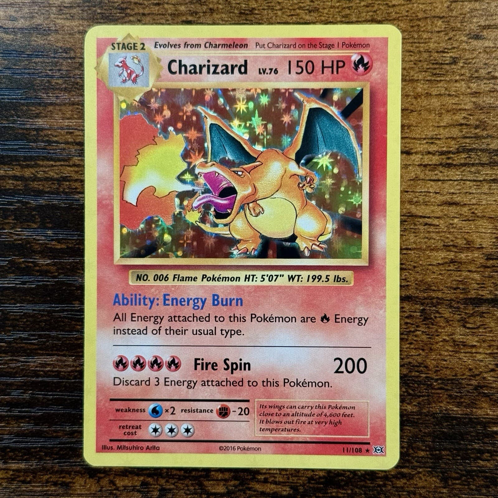 Listing photo for Charizard XY Evolutions 11/108 Holo Rare Stage 2 150 HP 2016 English