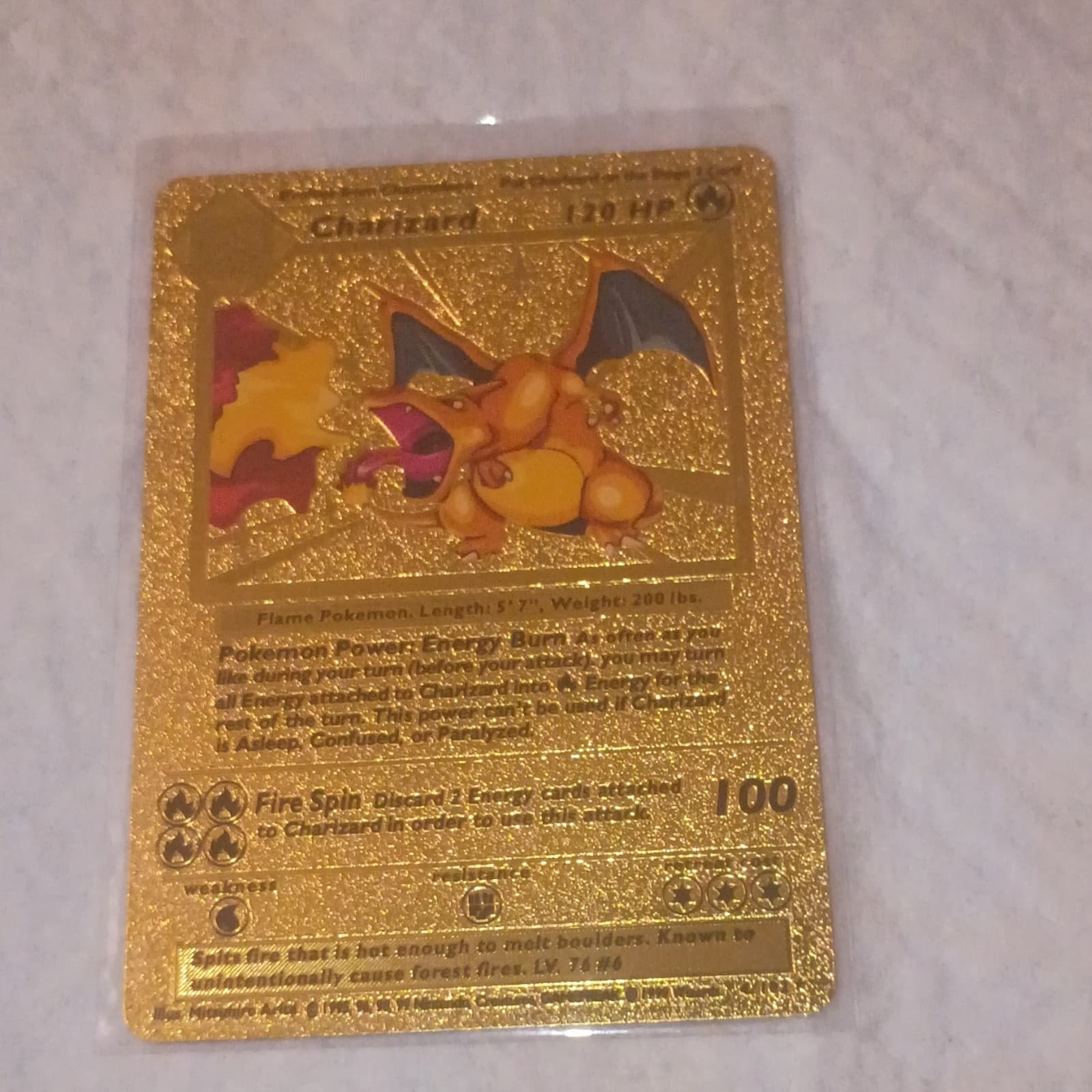 Listing photo for Pokémon Charizard 6 Gold Metal Foil 120 HP 100 Attack Standard Card