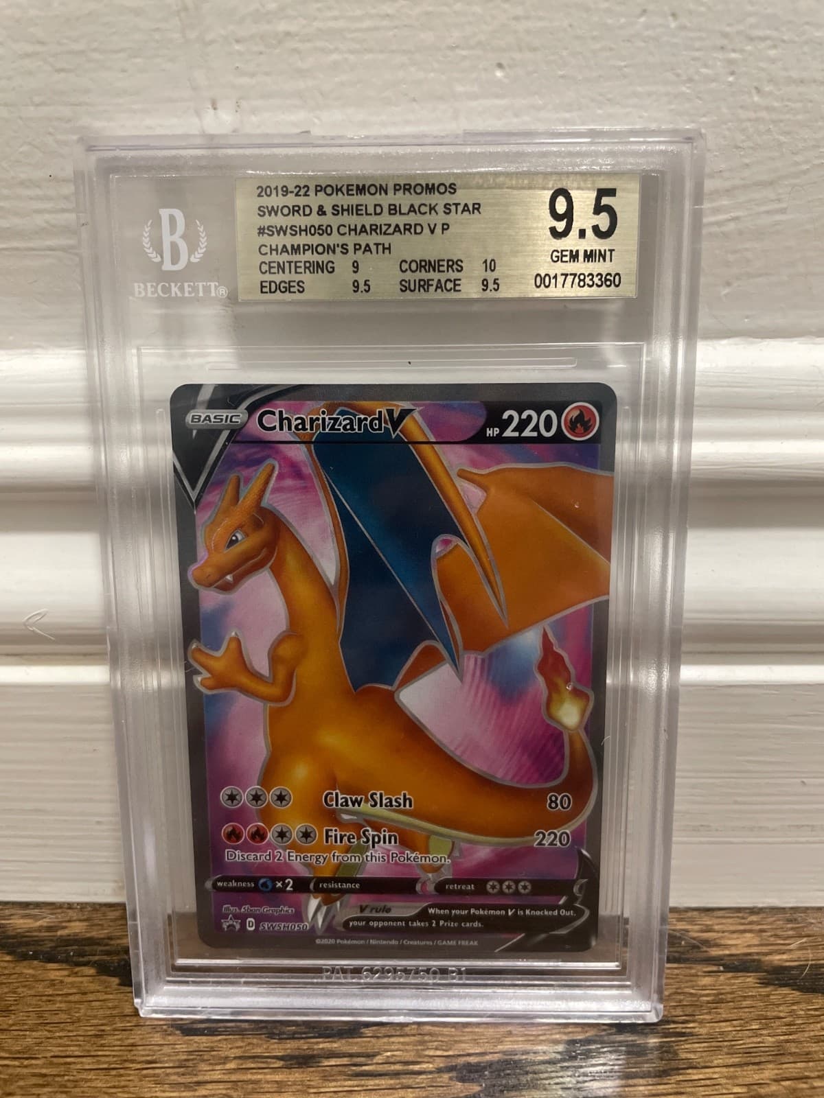 Listing photo for 2019-22 pokemon promos sword & shield nlack star #swsh050 charizard v