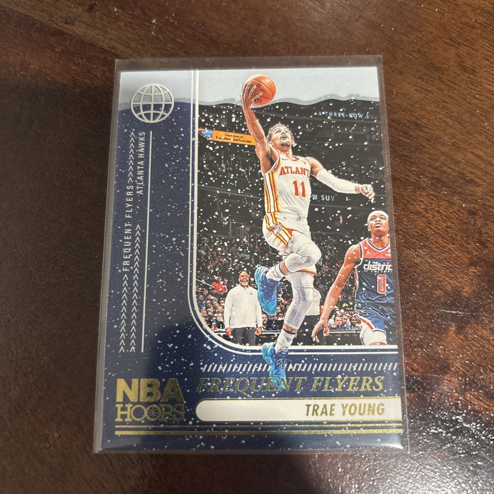 Listing photo for 2024-25 Panini Nba Hoops - Frequent Flyers Trae Young #12 Winter