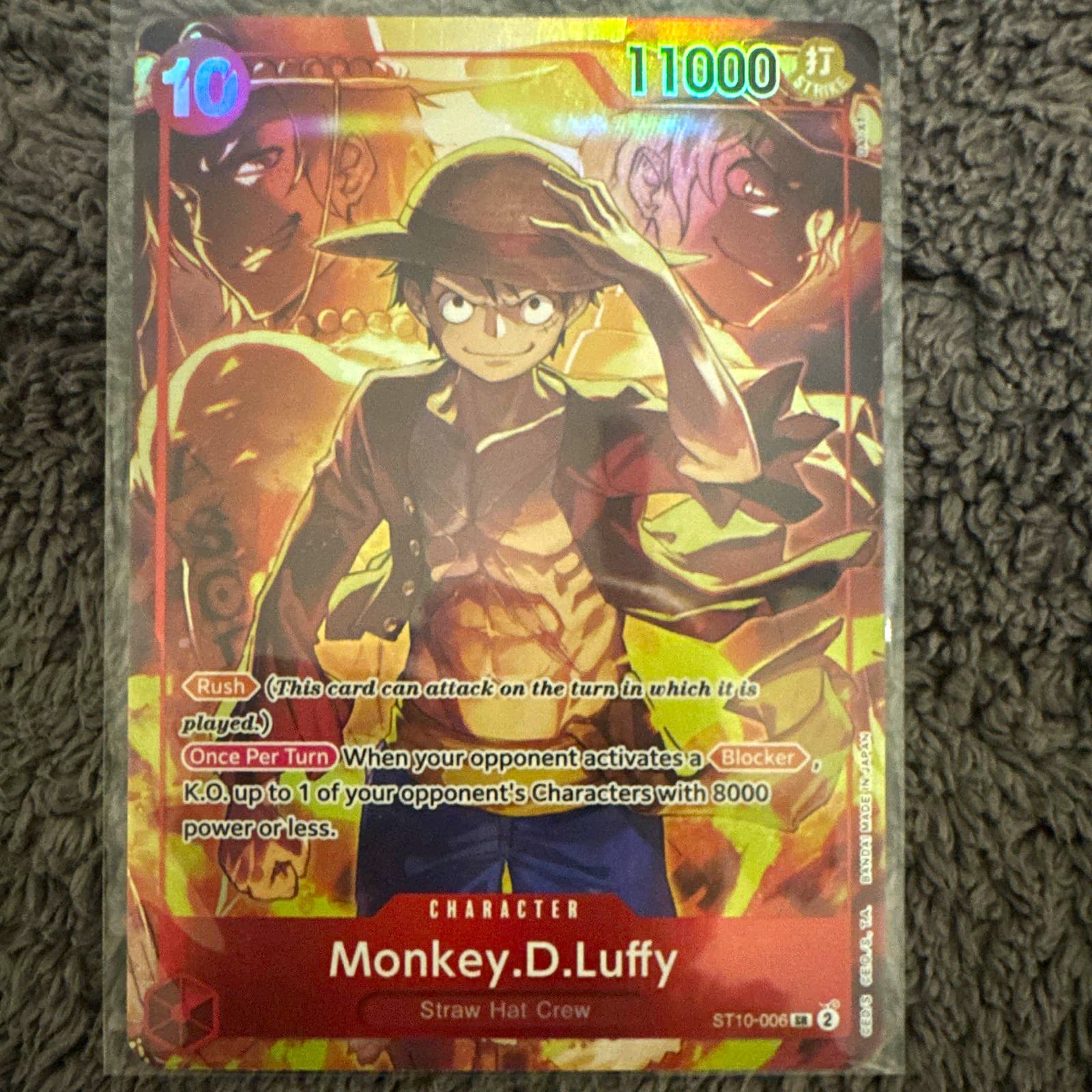 Listing photo for Bandai One Piece Card Game Monkey D. Luffy Character ST10-006 Foil Rush 11000