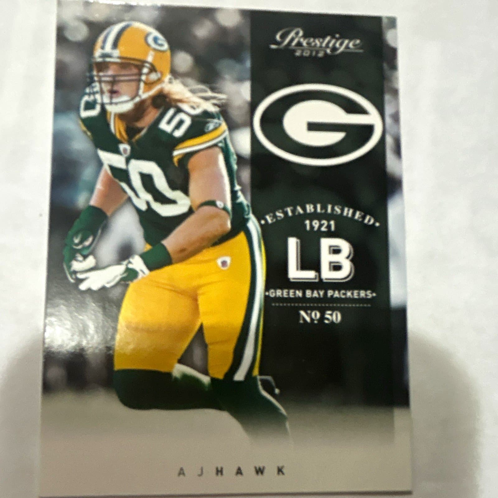 Listing photo for Panini Prestige 2012 AJ Hawk Green Bay Packers LB Base Set #50 NFL Card