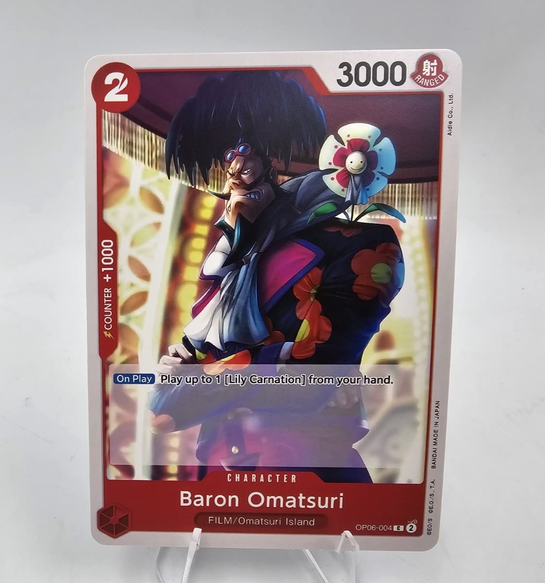 Listing photo for ONE PIECE WINGS OF CAPTAIN ENGLISH CARD GAME BARON OMATSURI OP06-004 EN M